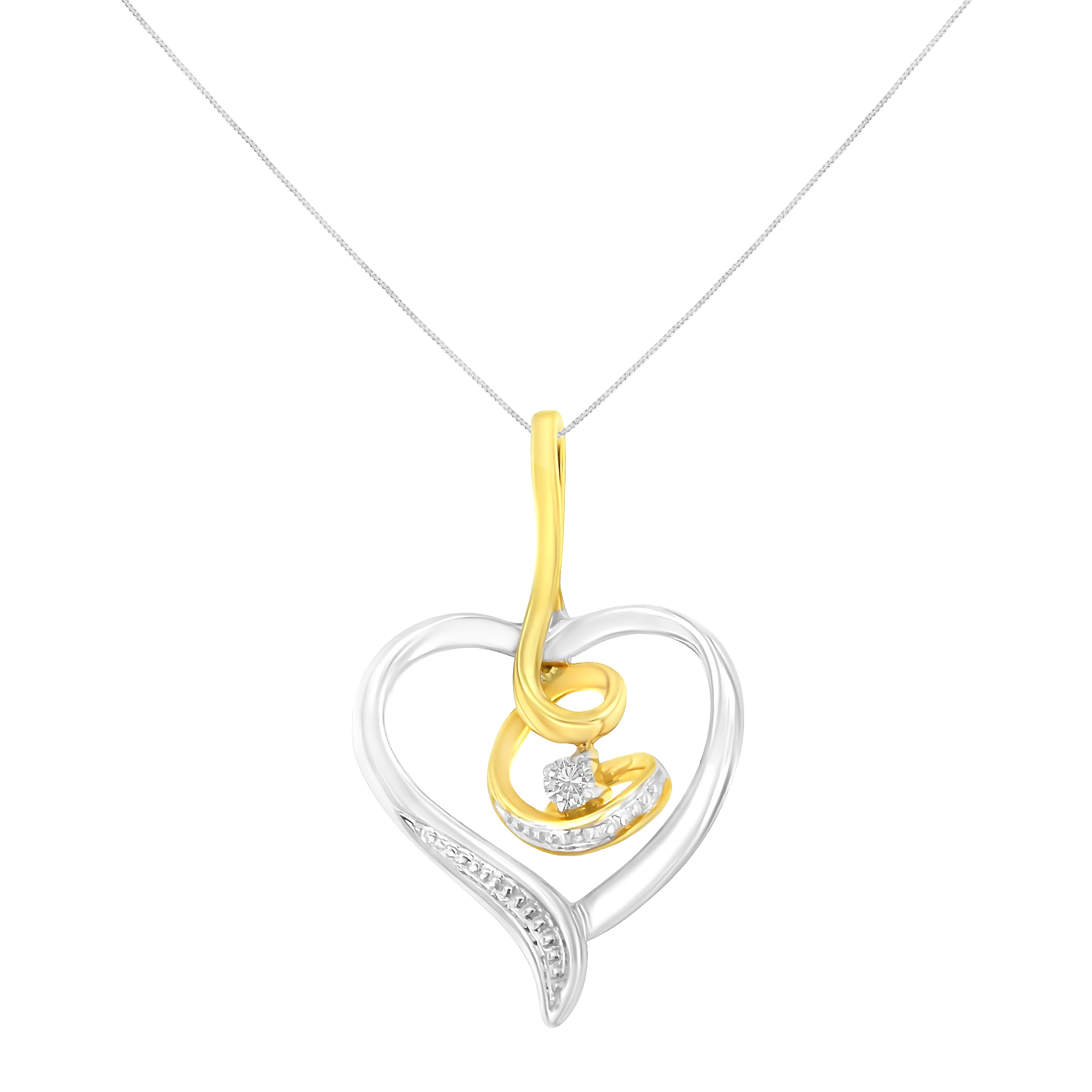 Close view of two-tone gold heart pendant