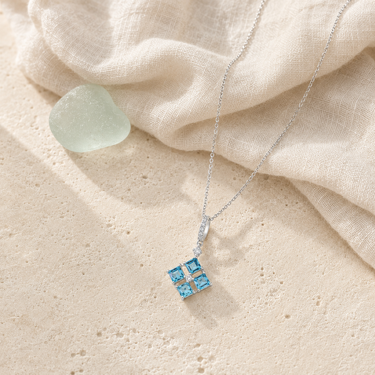 Azure blue topaz pendant necklace in coastal styling