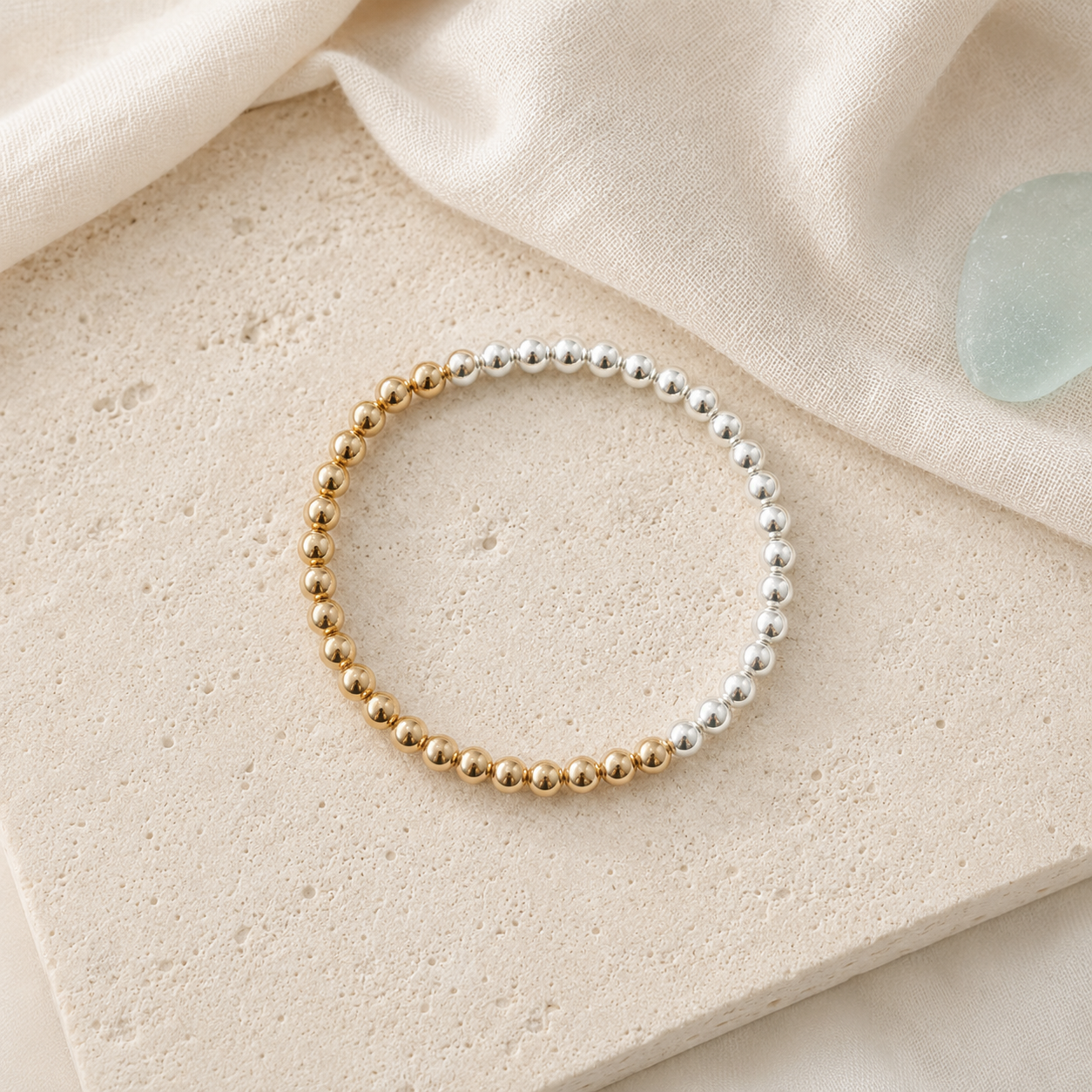 Sterling silver and 14K gold-filled moon bracelet in Mare & Gold coastal styling